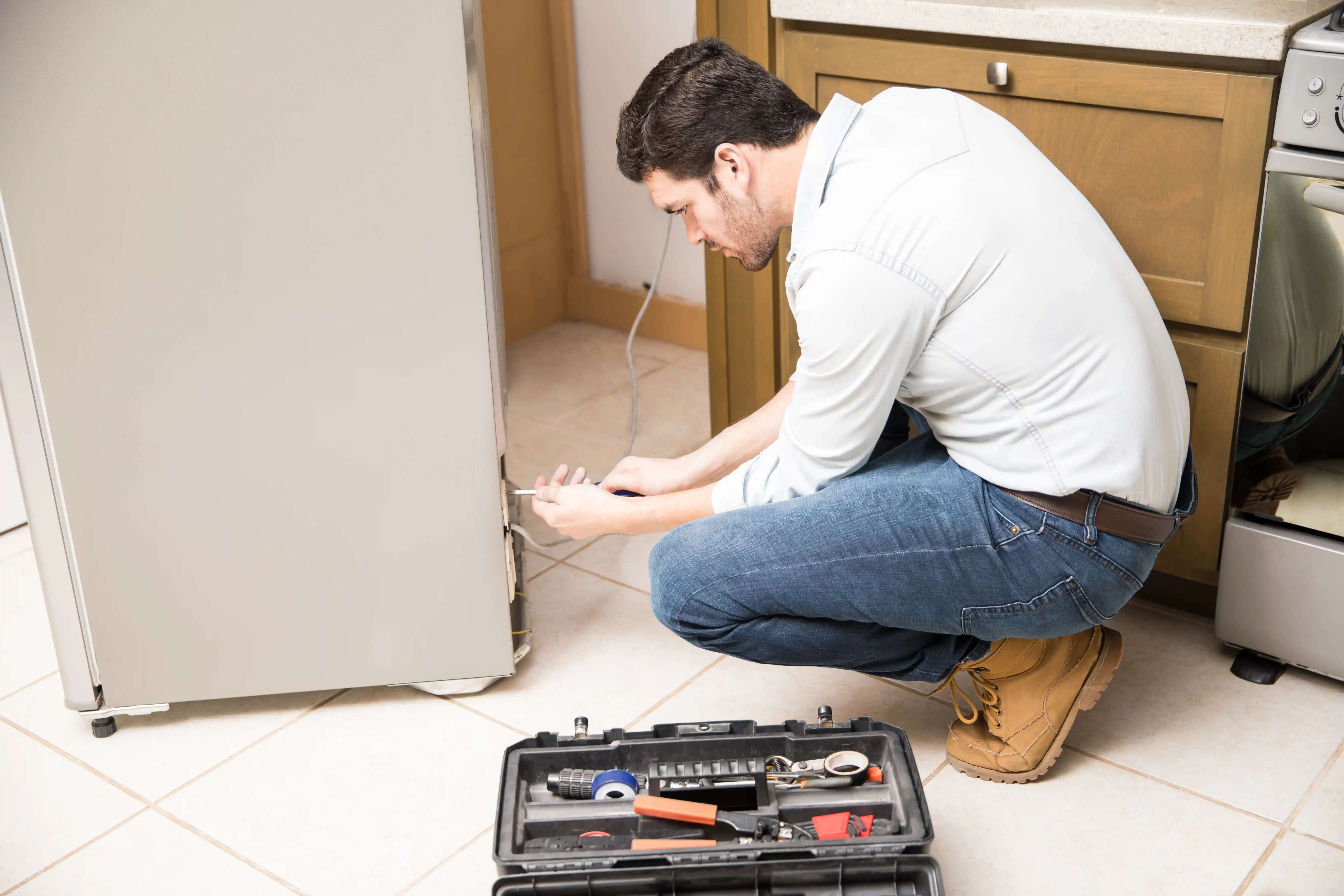 Water Under Your Fridge? Here's What’s Causing It - Appliance maintenance and repair tips
